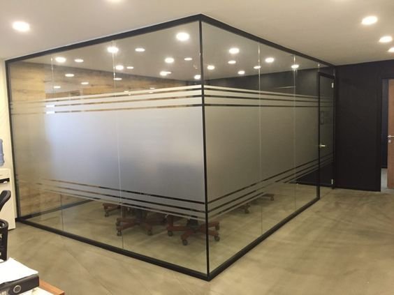 Corner glass office cabin with frosted stripe film