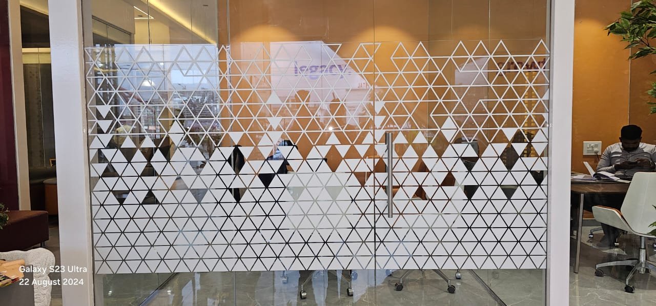White triangular frosted design on office glass doors