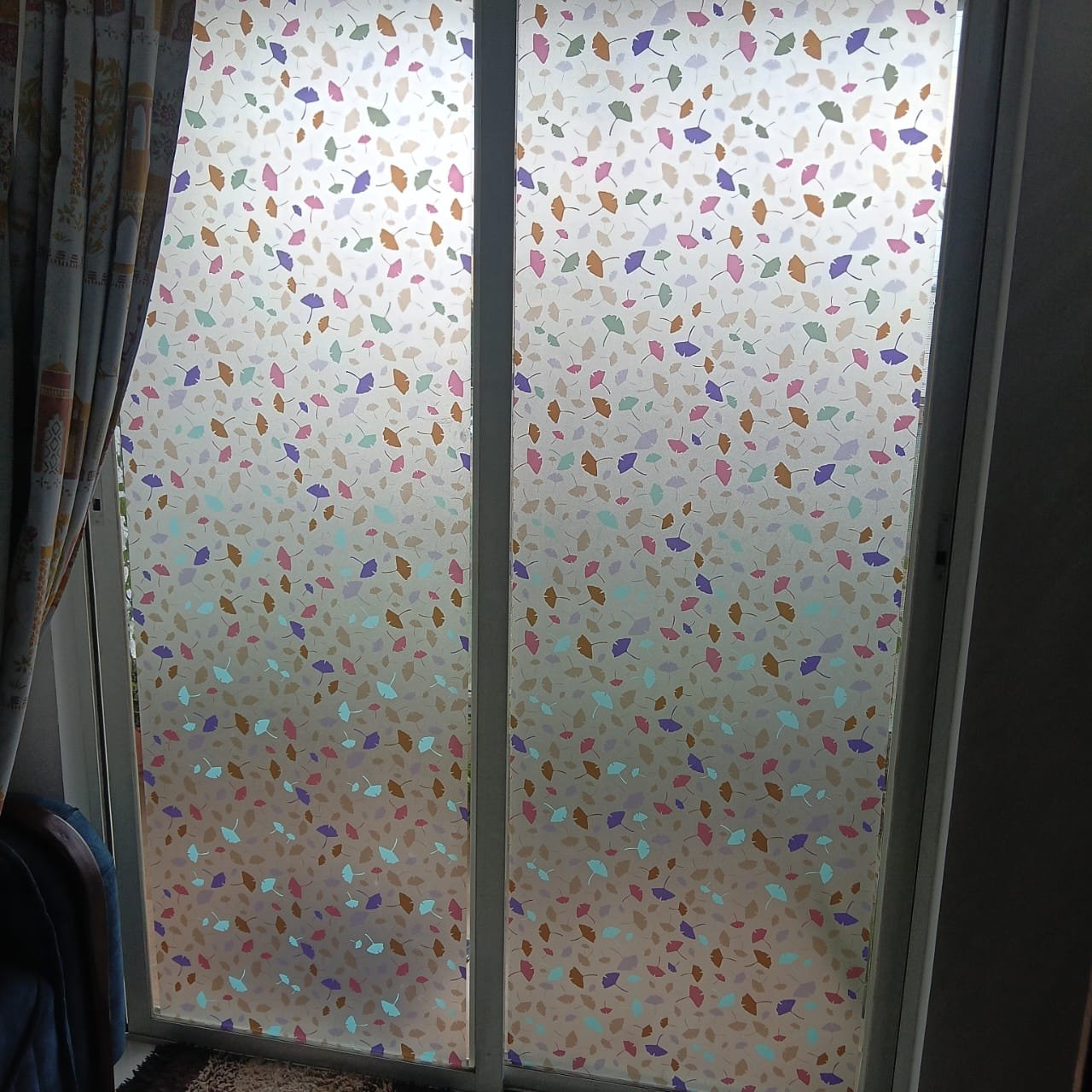Colorful leaf privacy film on sliding window